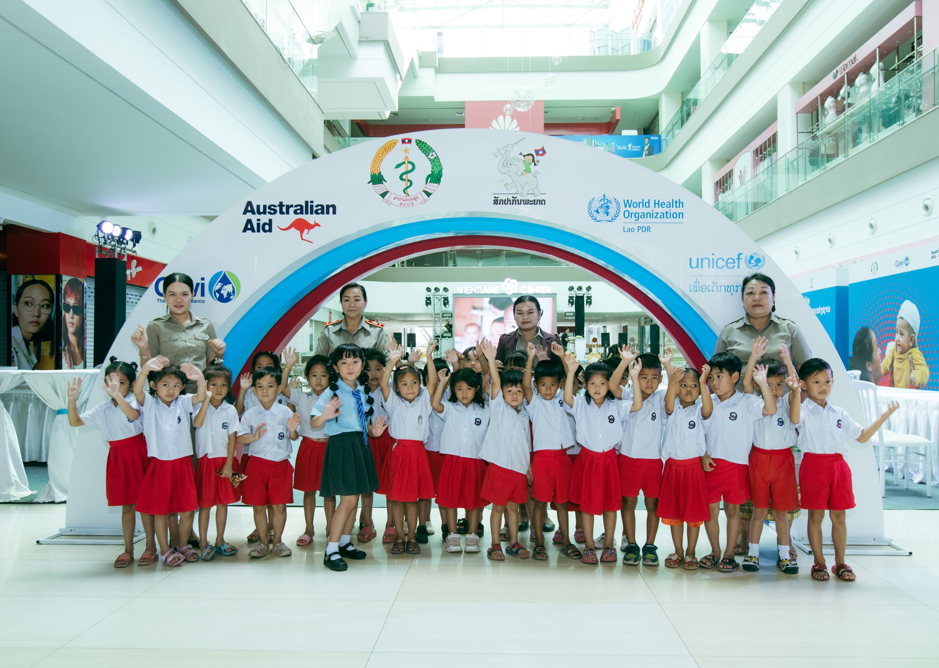 A group of children posing for a photoDescription automatically generated